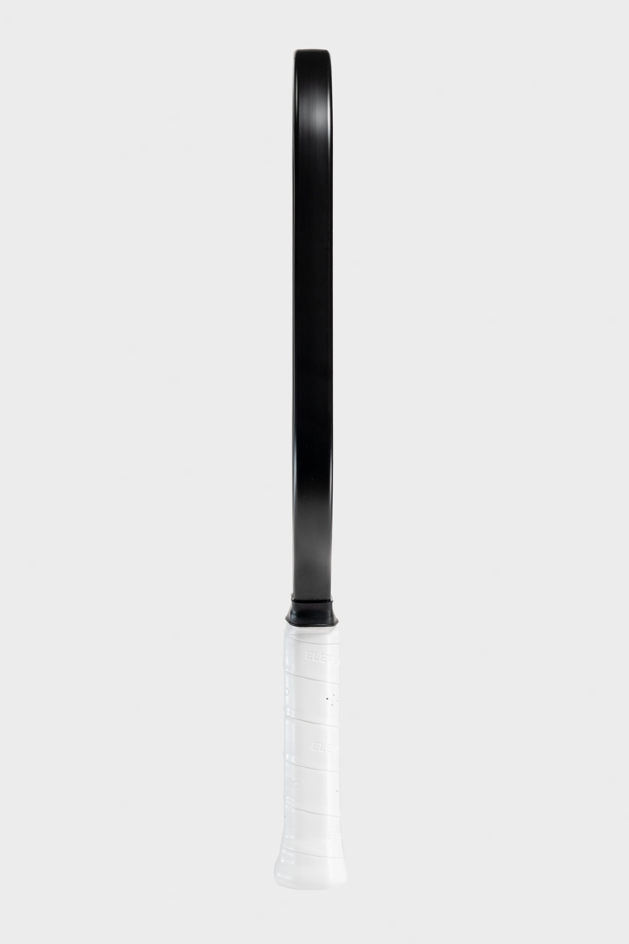 Studio shot of the Project Zero - EZ Speed E16 blackout paddle with a white background. Side view.