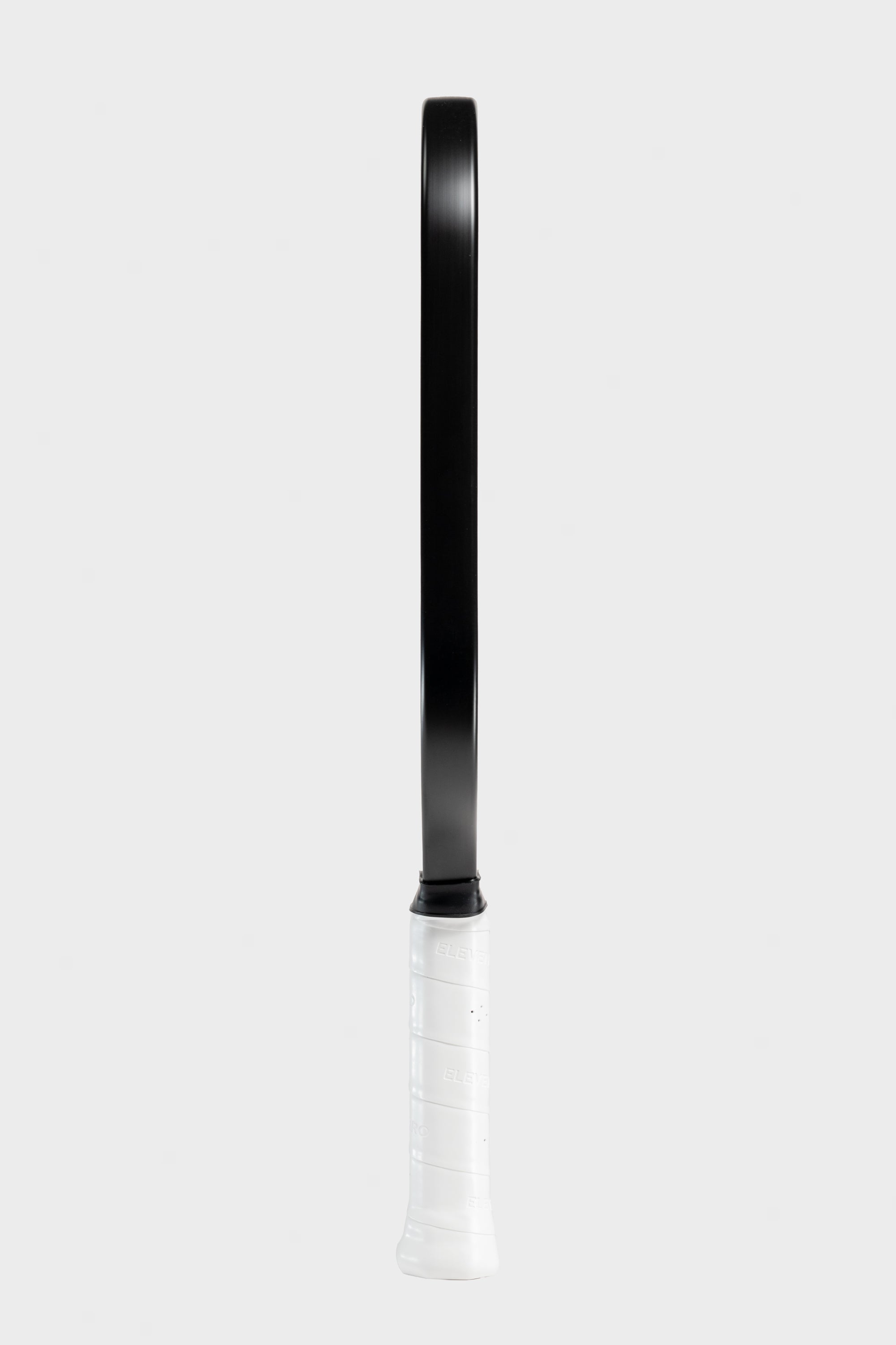 Studio shot of the Project Zero - EZ Speed H16 blackout paddle with a white background. Side view.