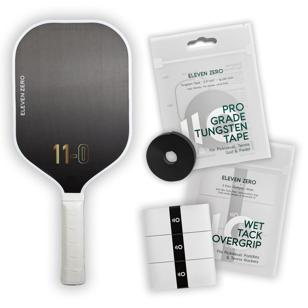 Eleven Zero Carbon pickleball paddle with overgrip tape and tungsten tape for enhanced control and stability.