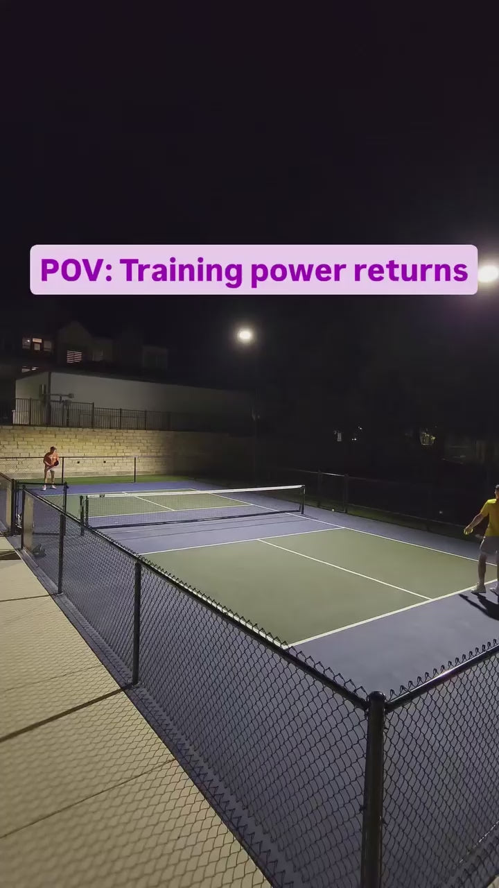Load video: Player demonstrating powerful forehand shots with the EZ Power Kevlar paddle during a competitive pickleball match.