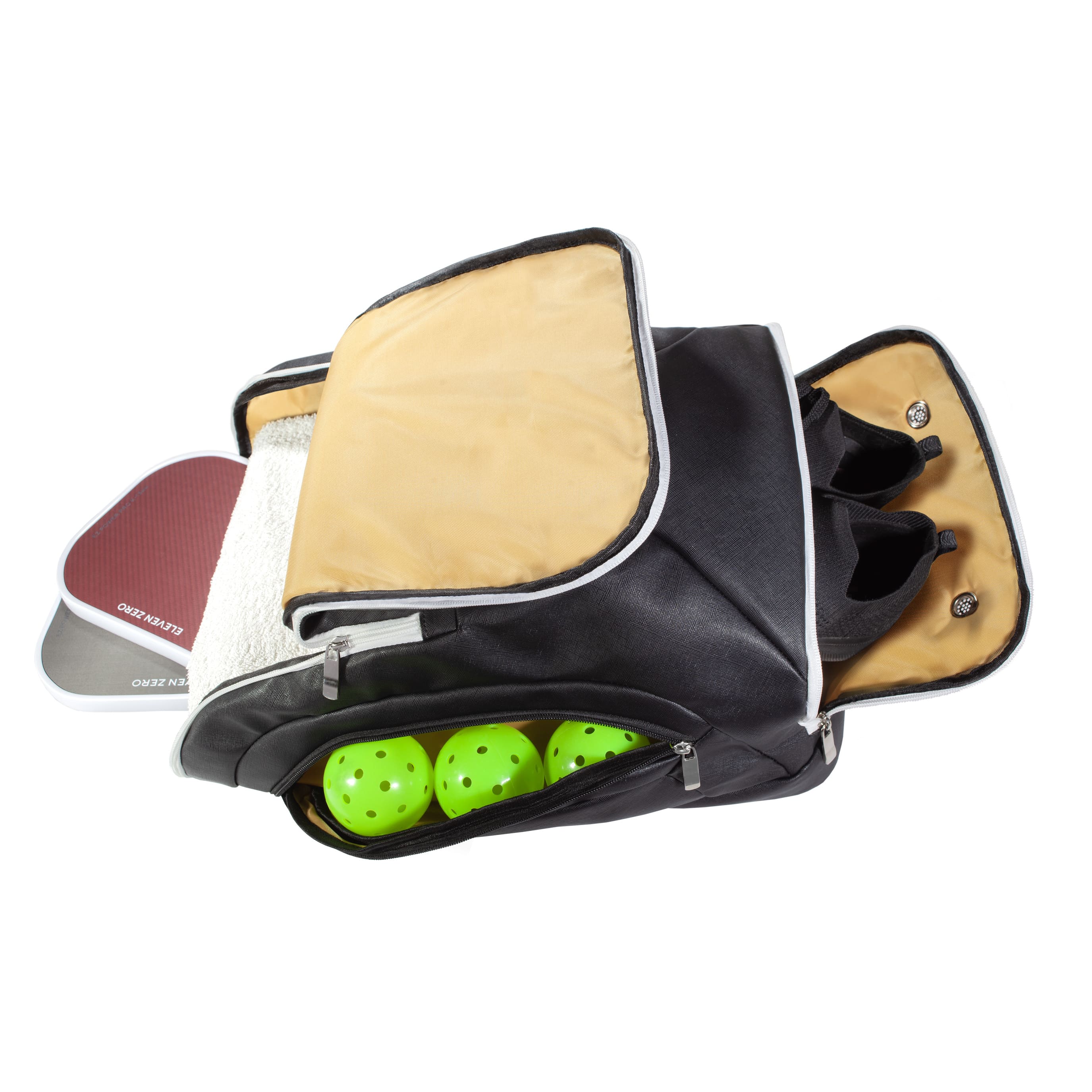 Open black Eleven Zero backpack showing compartments for shoes, pickleballs, paddles, and towel storage.