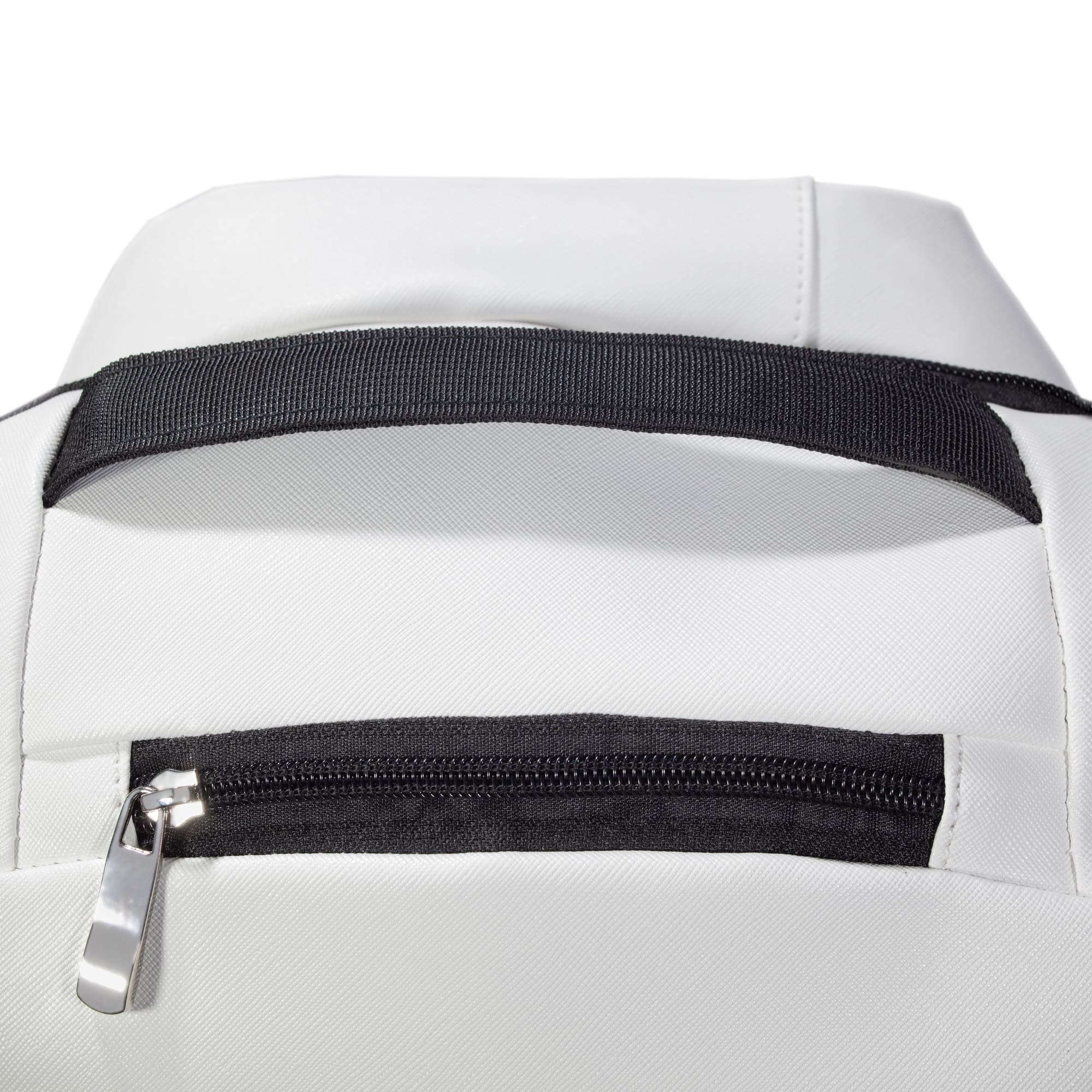 Close-up of top handle and zippered pocket on white Eleven Zero backpack.