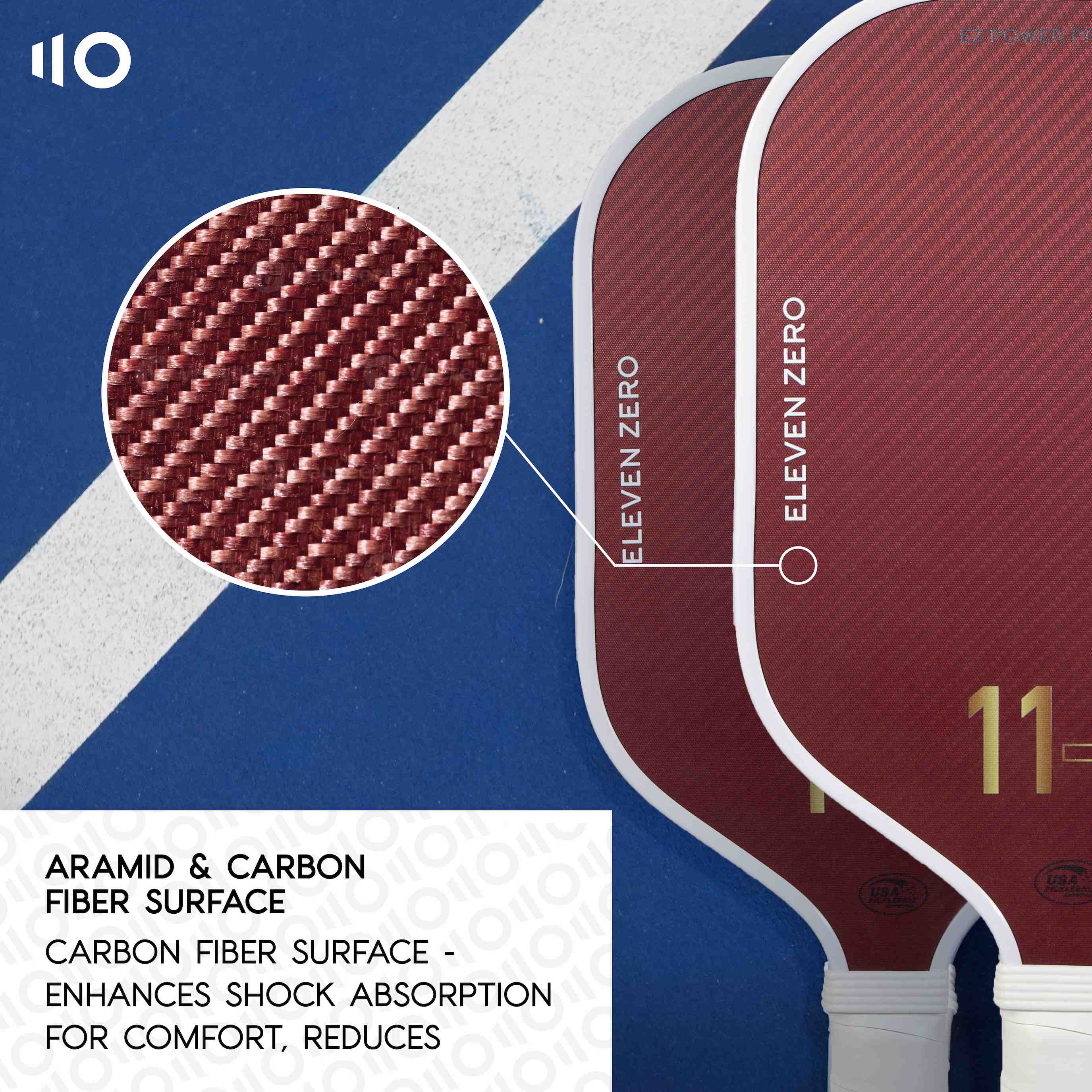 Close-up view of the maroon Aramid Carbon surface texture on Eleven Zero pickleball paddles, emphasizing enhanced shock absorption for comfort and reduced vibration during play.