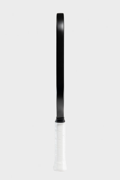 Studio shot of the Project Zero - EZ Speed H16 blackout paddle with a white background. Side view.