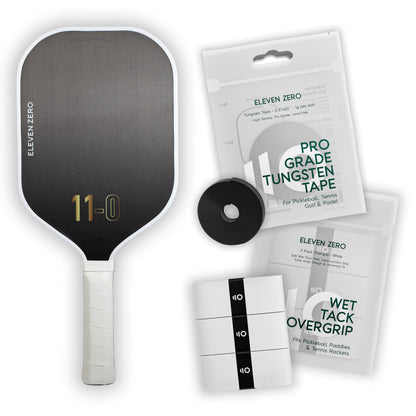 Eleven Zero Carbon pickleball paddle with overgrip tape and tungsten tape for enhanced control and stability.
