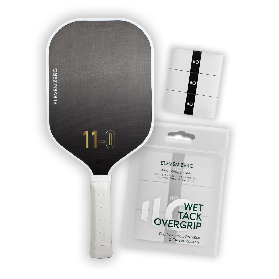 Carbon fiber Eleven Zero pickleball paddle and overgrip tape bundle showcasing performance-ready setup.