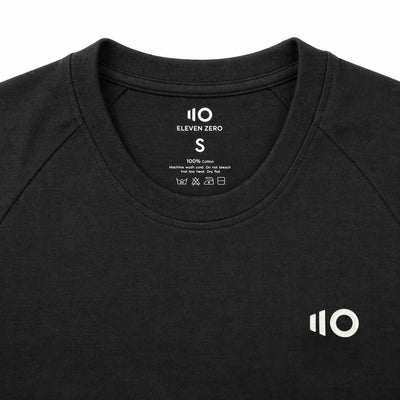 Black t-shirt with '110' logo and text on a white background
