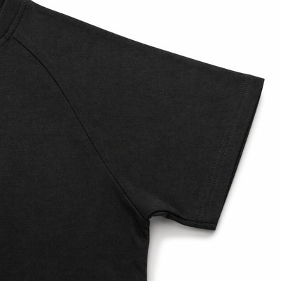 Black t-shirt sleeve on a light gray background