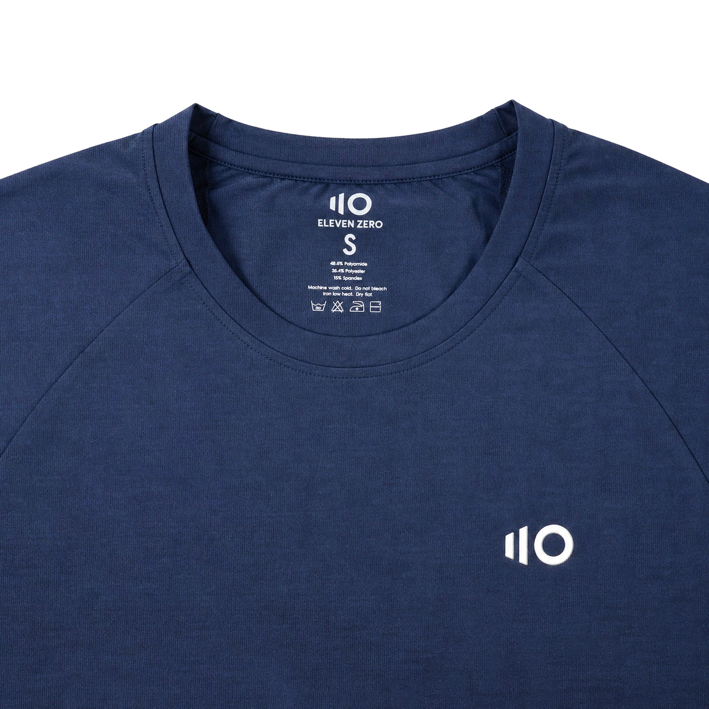 Navy blue t-shirt with 'Eleven Zero' logo on a light gray background
