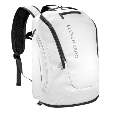 Front angled view of white Eleven Zero backpack showing top zippered pocket and logo detailing.