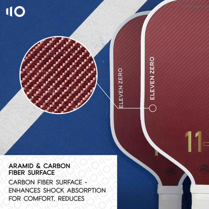Close-up view of the maroon Aramid Carbon surface texture on Eleven Zero pickleball paddles, emphasizing enhanced shock absorption for comfort and reduced vibration during play.