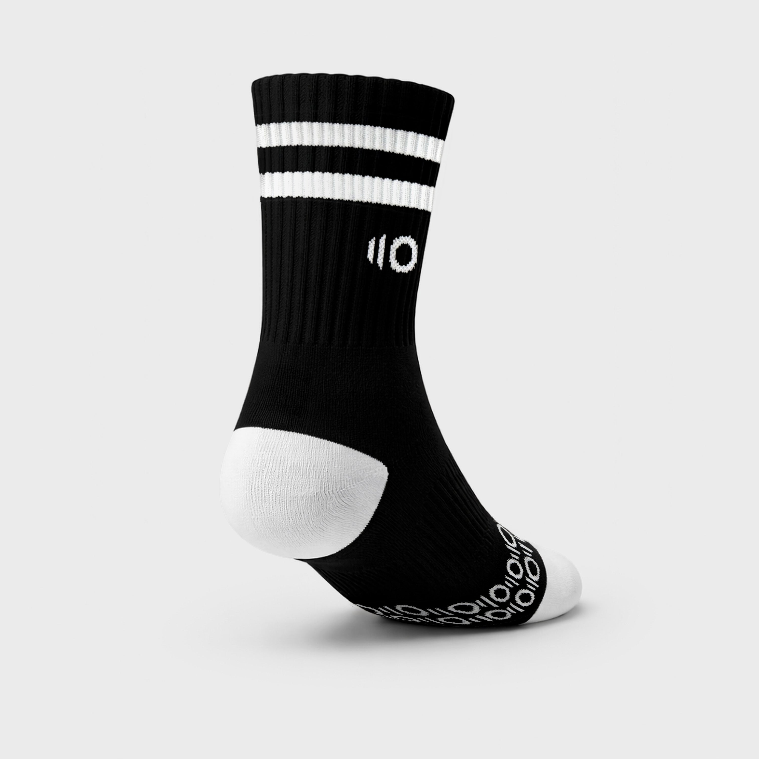 Black sock with white stripes and logo on a light gray background