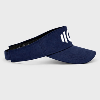 Navy blue visor with a white logo on a light gray background