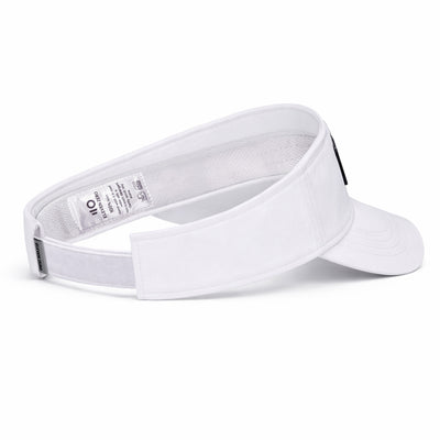 White visor with a brand label on a white background