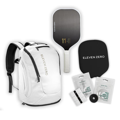 White Eleven Zero pickleball backpack shown with carbon paddle, paddle cover, overgrips, and tungsten tape.