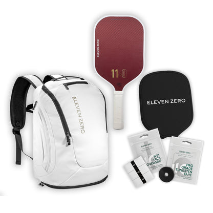 White Eleven Zero backpack with Kevlar paddle, paddle cover, wet tack overgrips, and tungsten tape for customization.