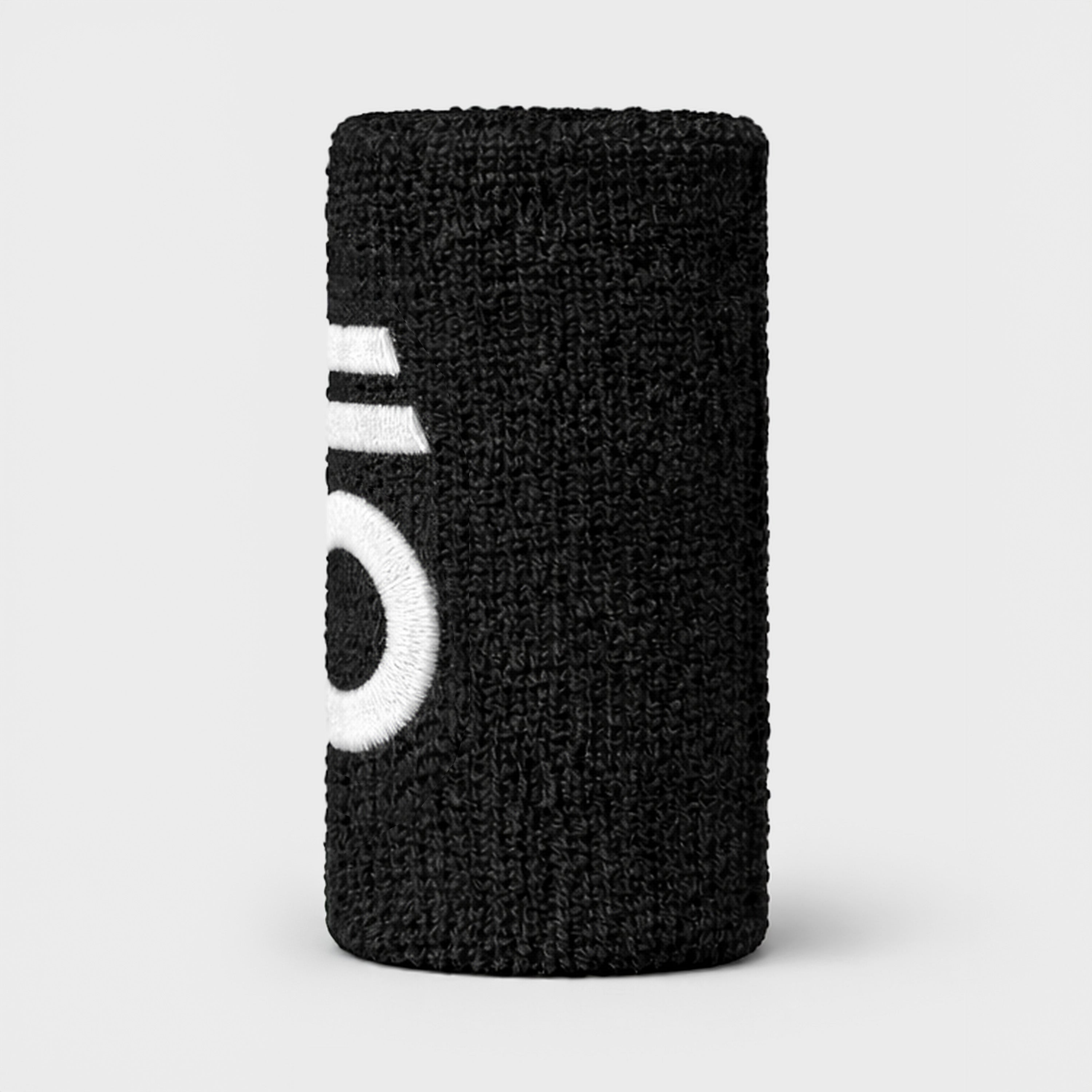 Black wristband with a white logo on a light gray background